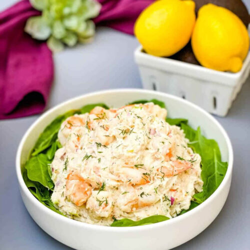 crab salad with real lump crab meat on a bed of lettuce in a white bowl
