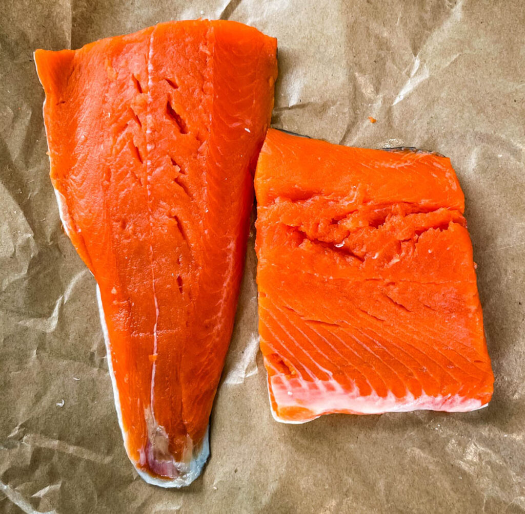 raw salmon on a flat surface