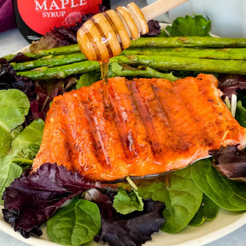 cook salmon drizzled with maple syrup