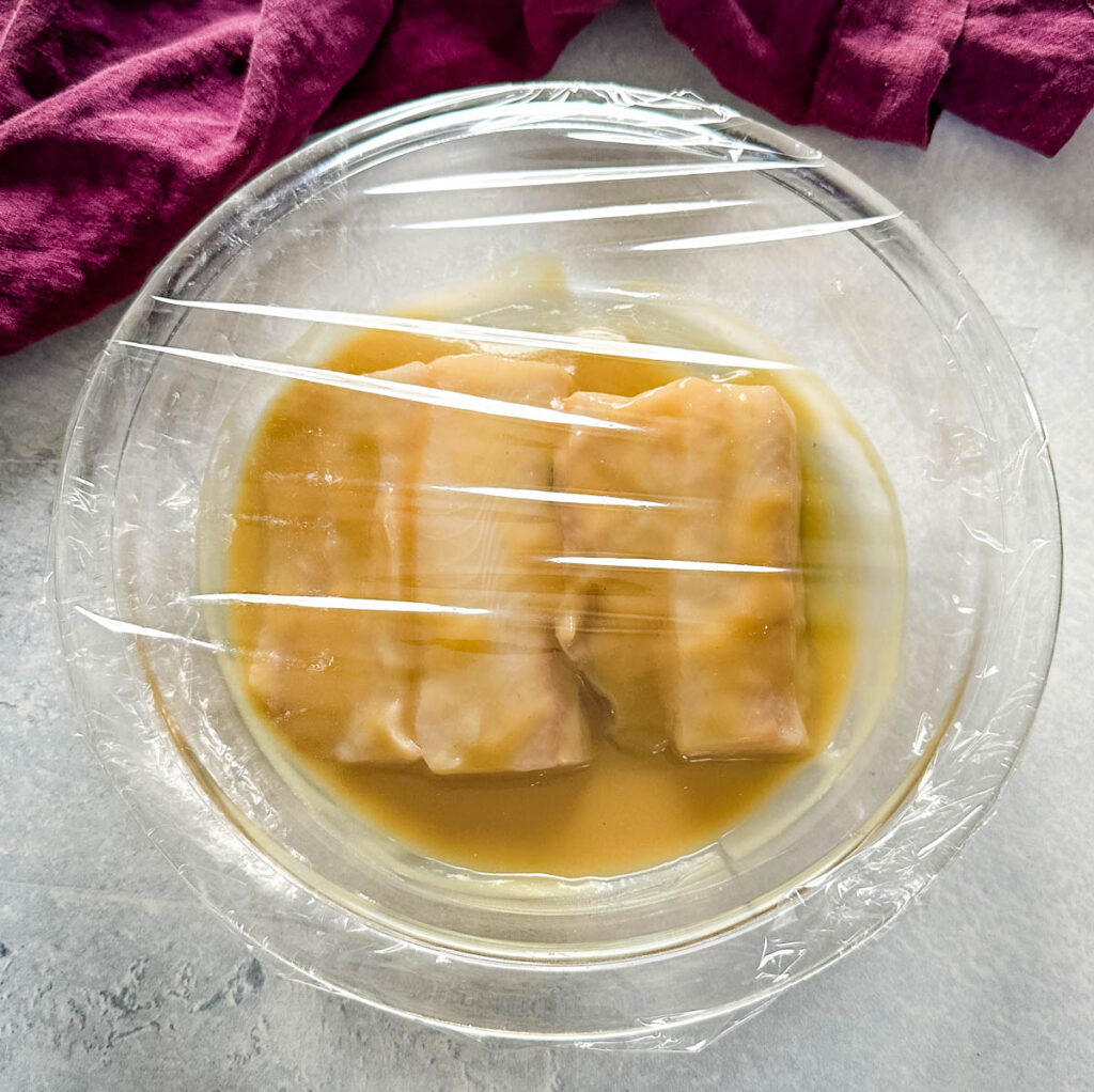 black cod marinated with miso sauce in a glass pan