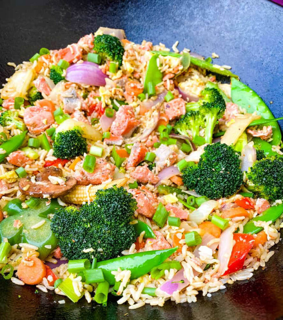 salmon fried rice in a wok