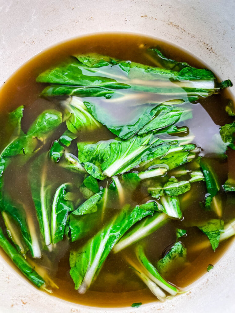 shrimp soup and vegetables in a large soup pot