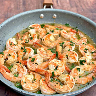 shrimp scampi without wine in a pan with parsley