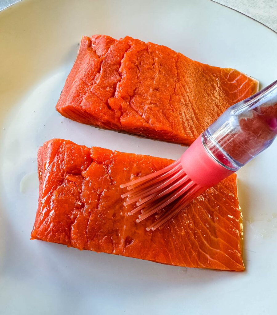raw salmon brushed with olive oil
