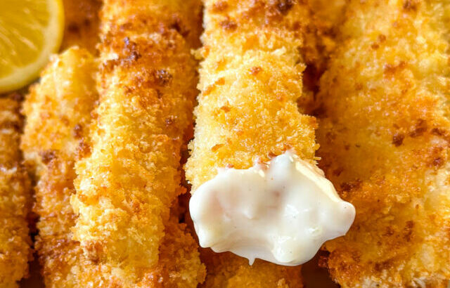 homemade fish sticks on a plate with tartar sauce