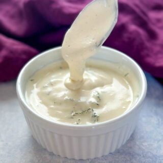 a spoonful of creamy dill sauce