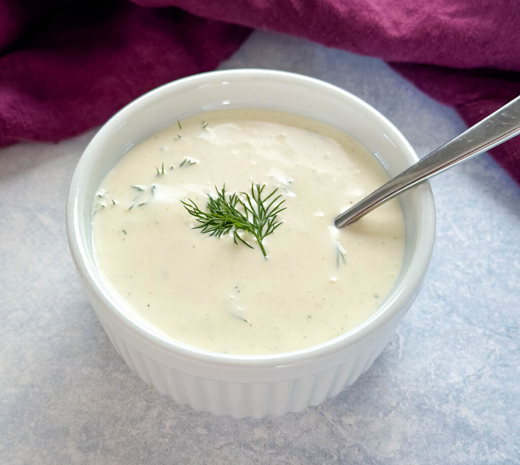 a spoonful of creamy dill sauce