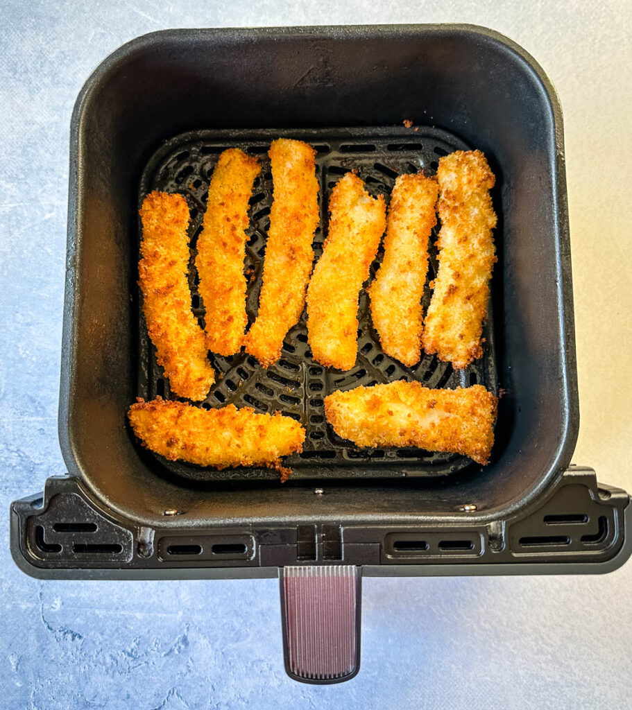 cooked fish sticks in an air fryer