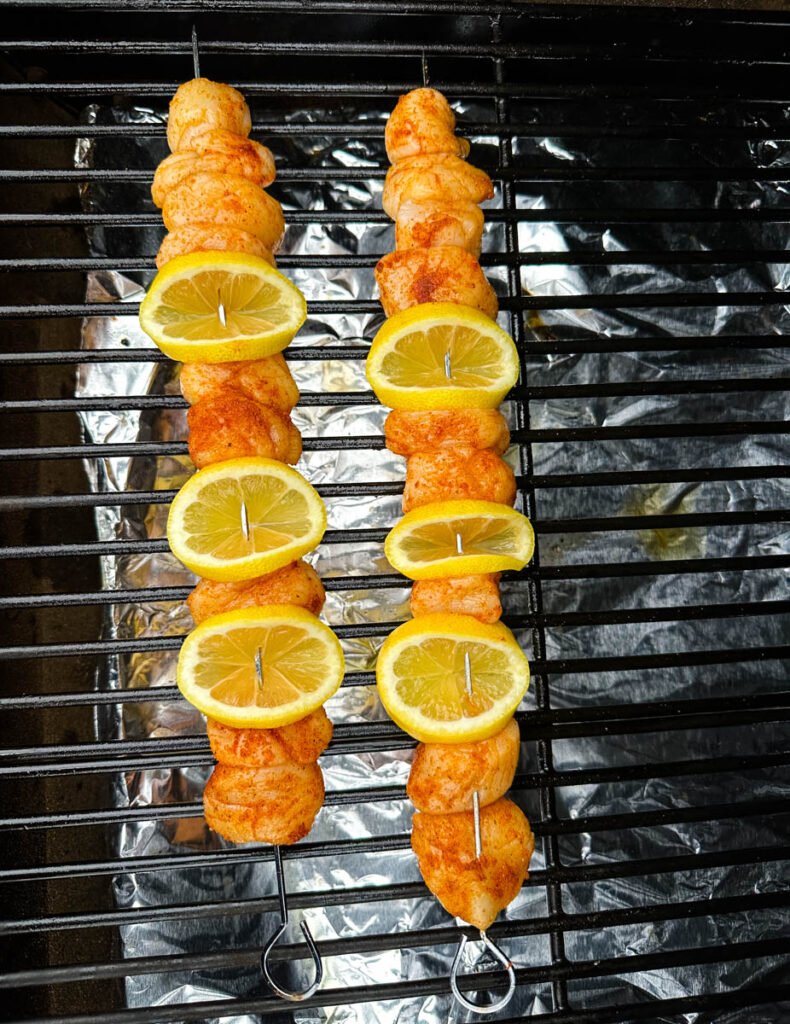 scallops and lemons on a skewer on a Traeger grill