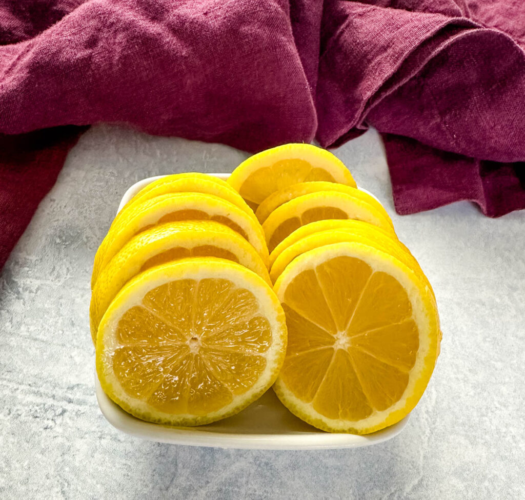 fresh lemons sliced in rounds