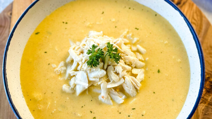 crab bisque in a white bowl with lump crab meat and flour