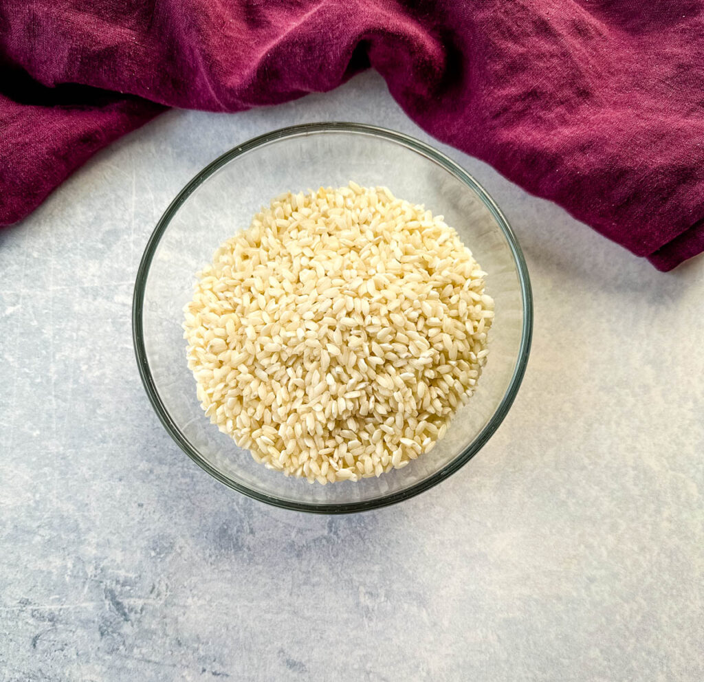 arborio rice for risotto in a glass bowl