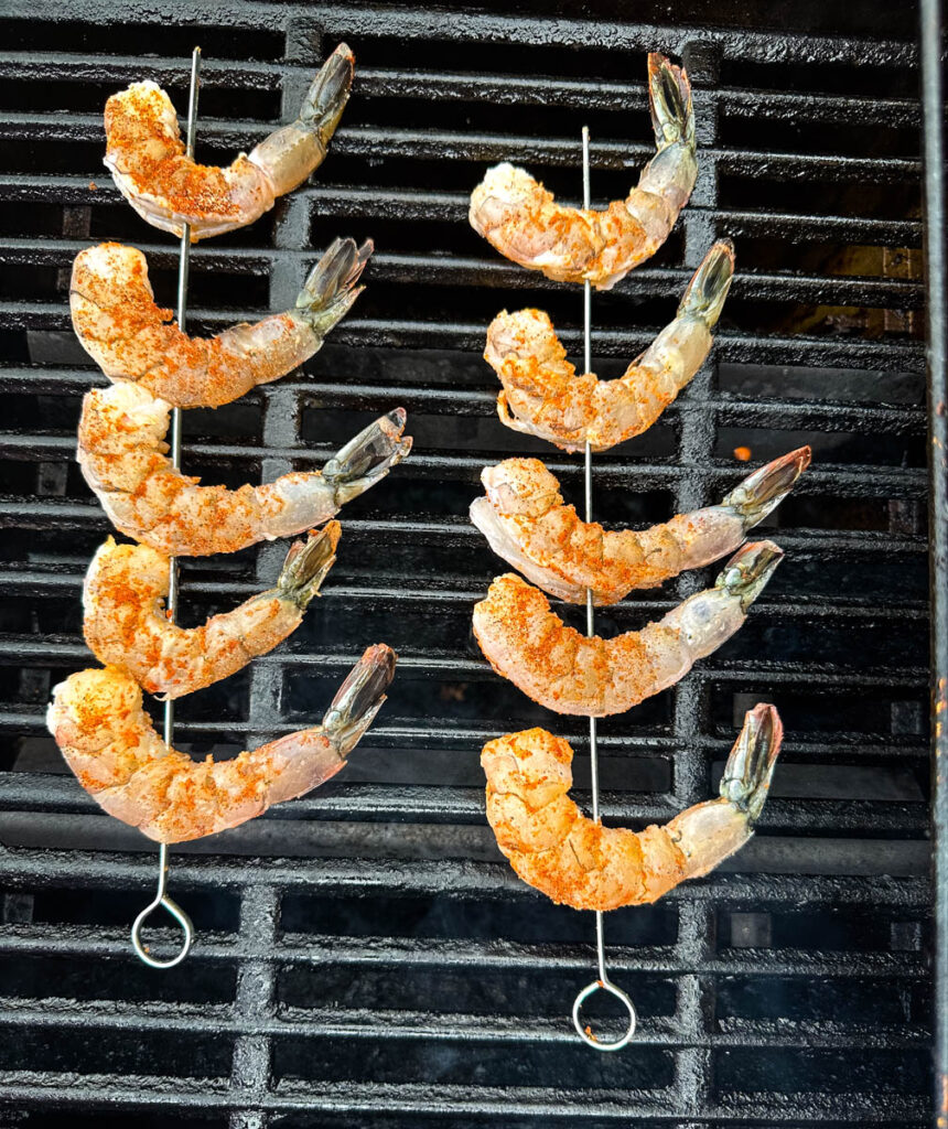 grilled shrimp on skewers on a grill