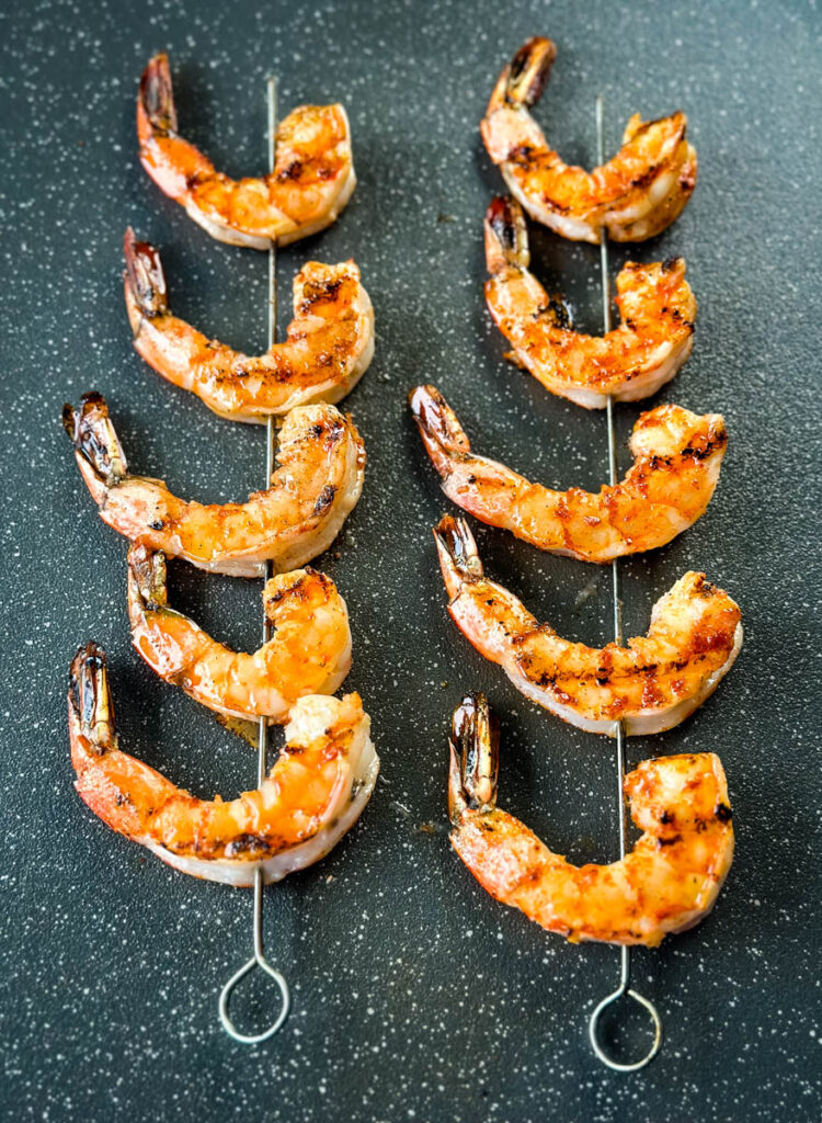 grilled shrimp on metal skewers