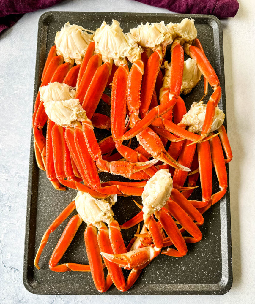 crab legs on a sheet pan