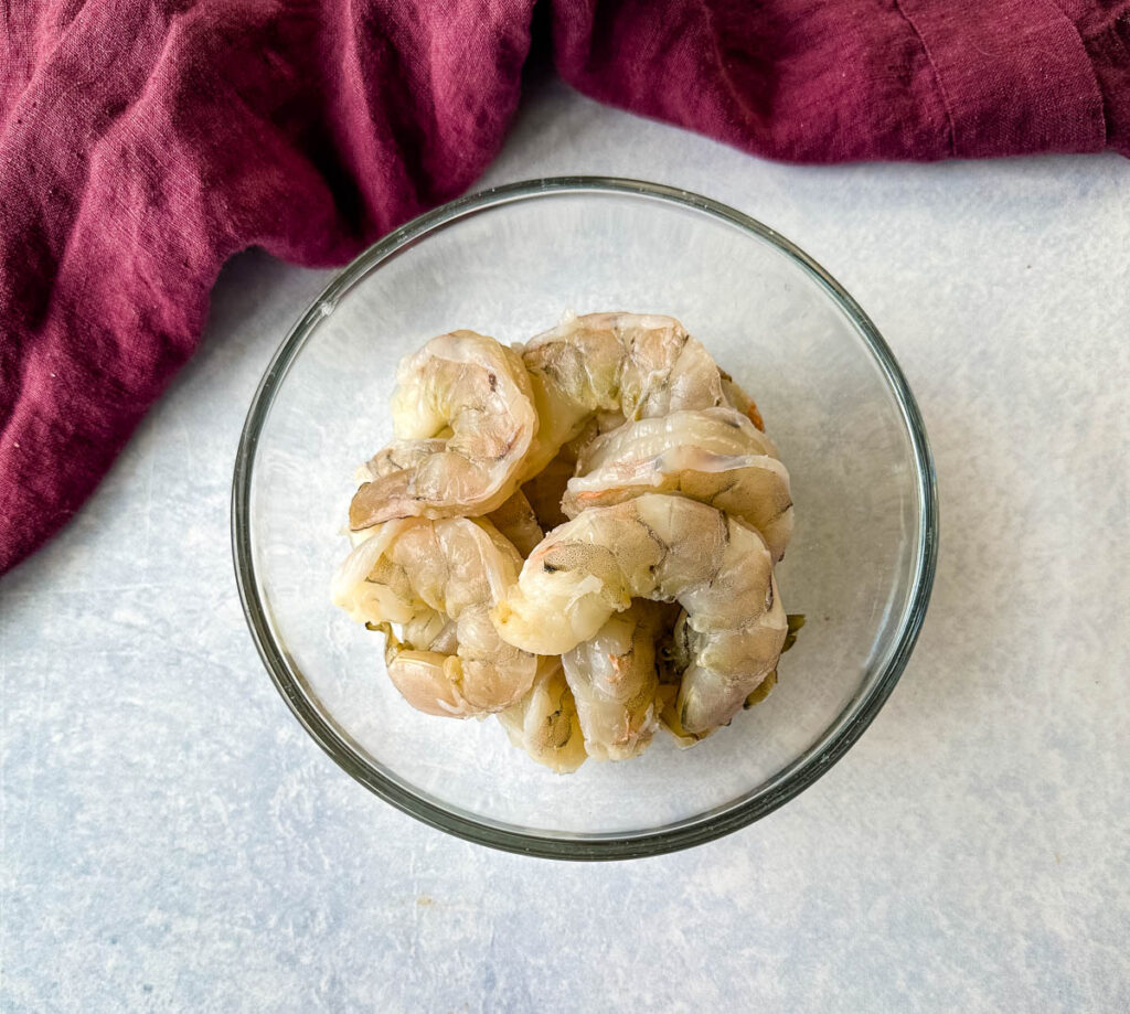 raw shrimp in a glass bowl