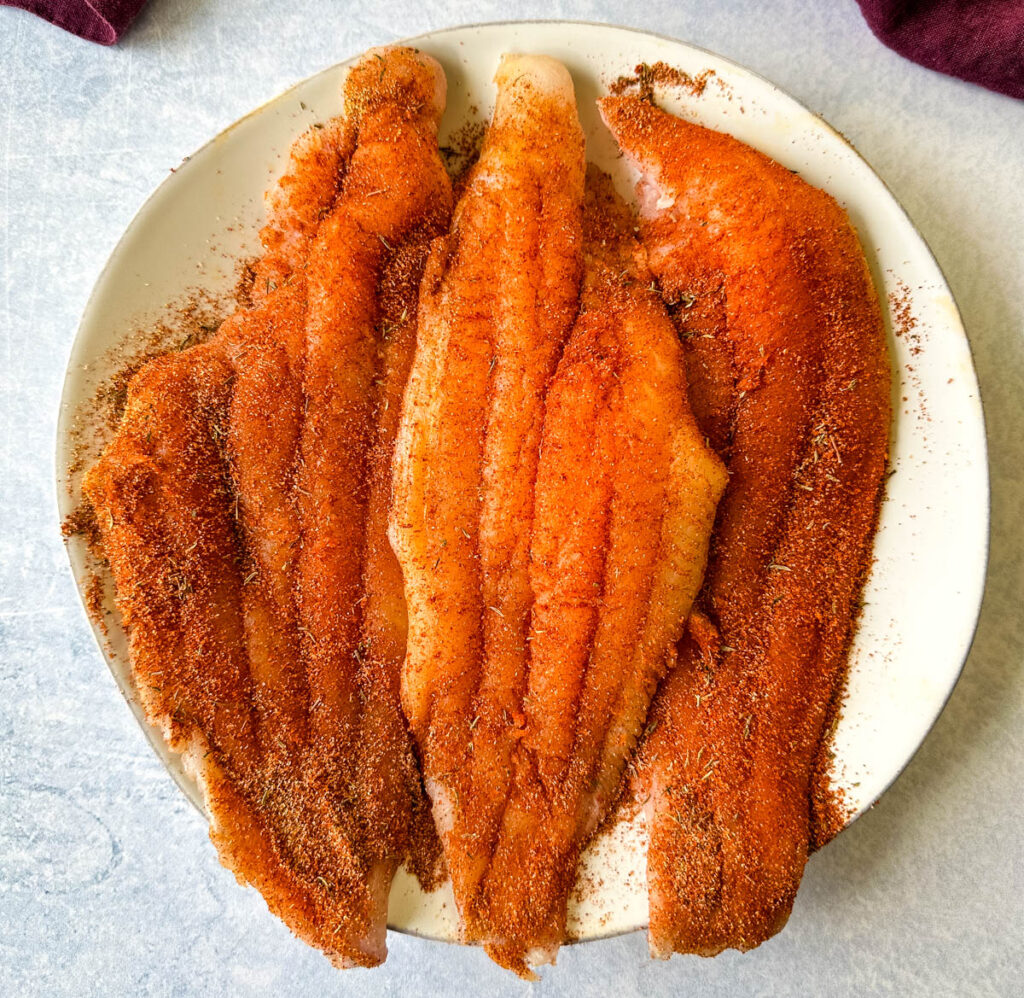seasoned fish on a plate