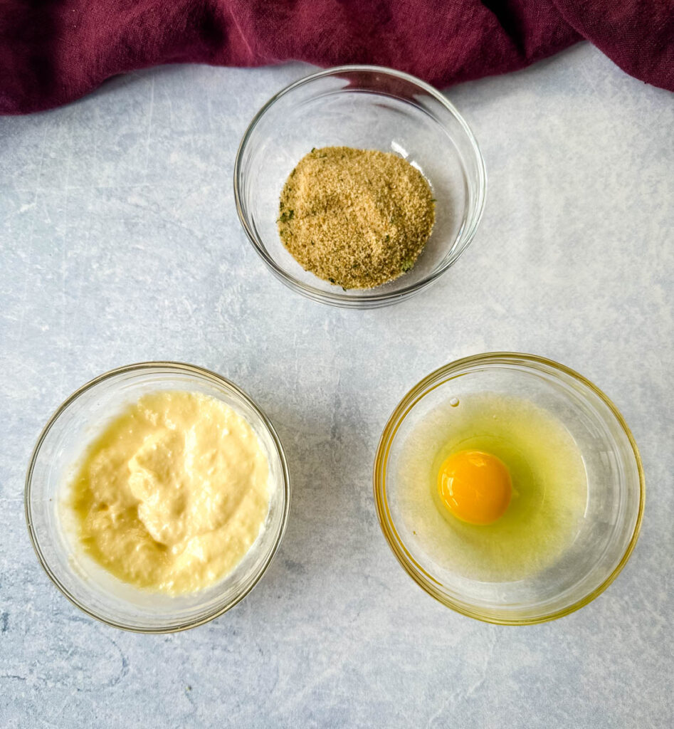 egg, breadcrumbs, and mayo in separate glass bowls