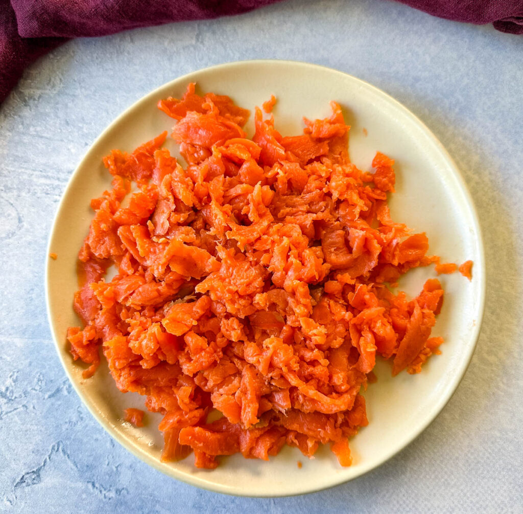 shredded smoked salmon on a plate