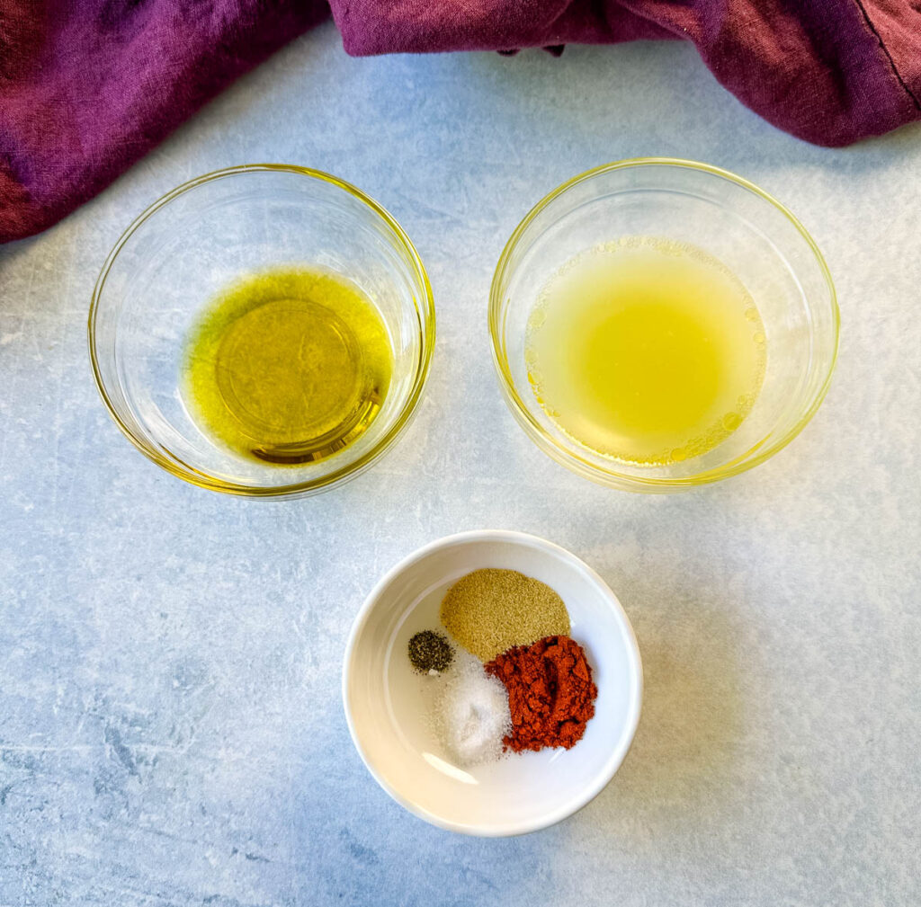 olive oil, lemon juice, and spices in separate bowls