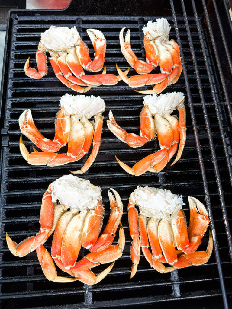 Dungeness crab legs on a grill