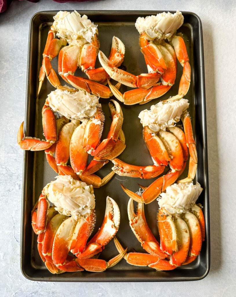 Dungeness crab legs on a sheet pan
