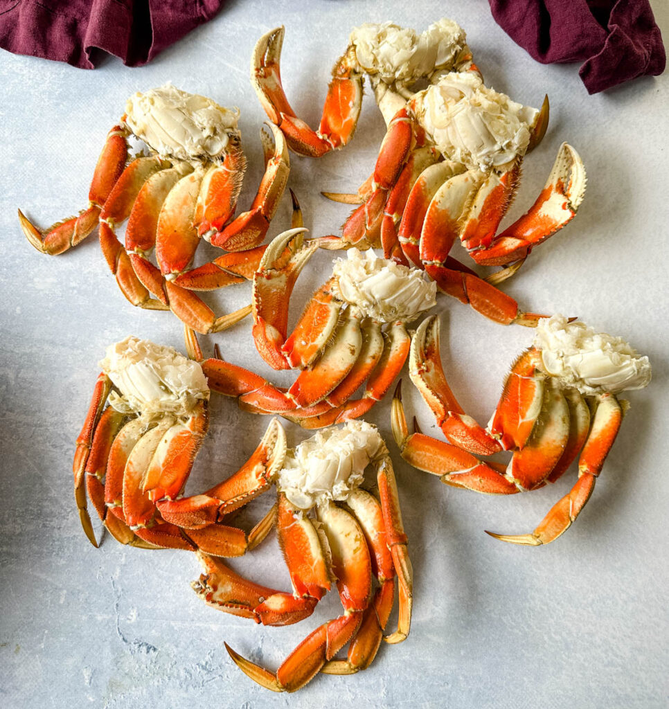 Dungeness crab legs on a flat surface