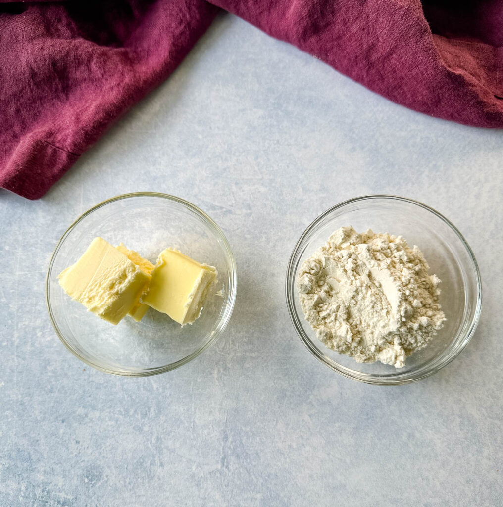 slices of butter and all purpose flour in separate glass bowls