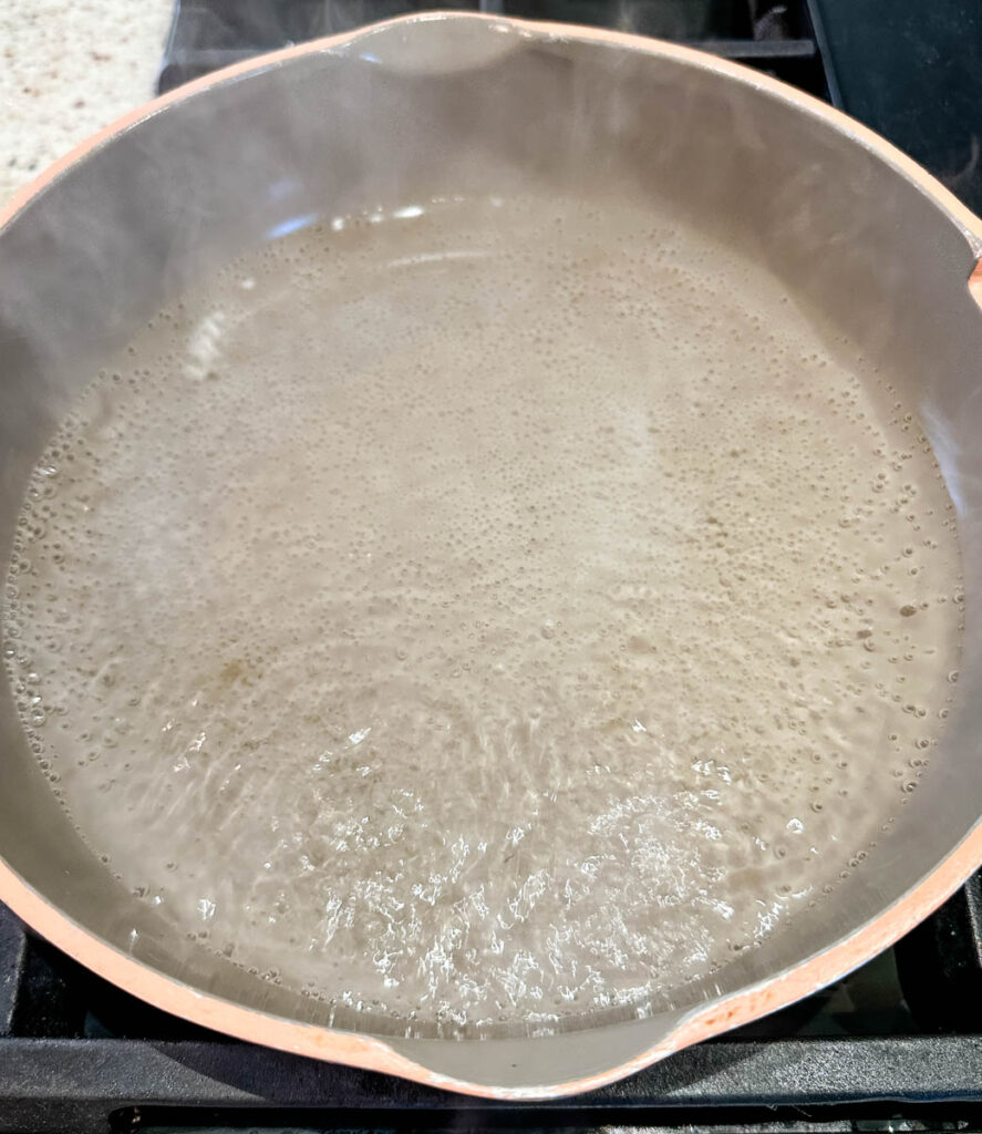 an inch of water in a skillet