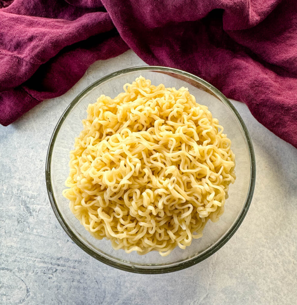 cooked ramen noodles in a glass bowl