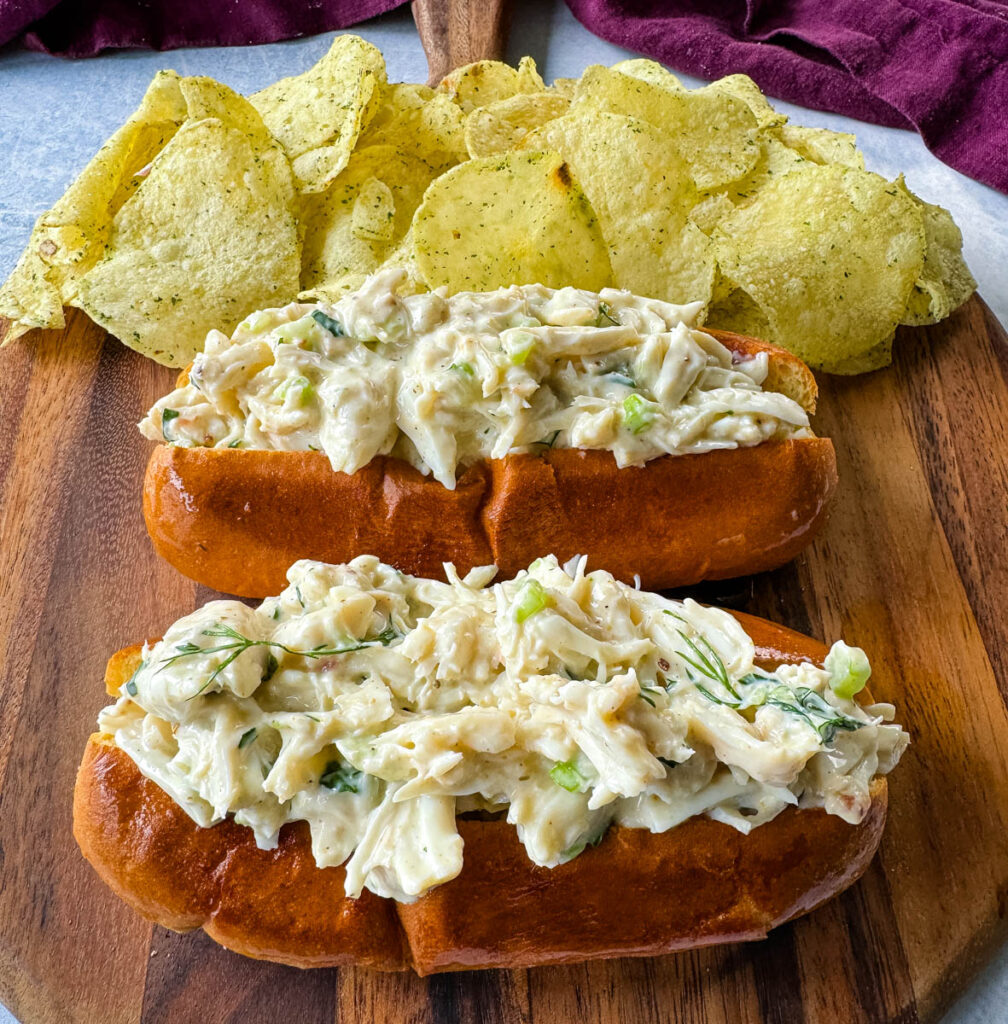 crab seafood rolls on buns with chips